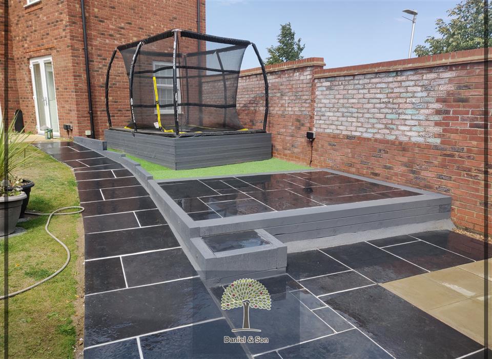 In ground trampoline and hot tub patio